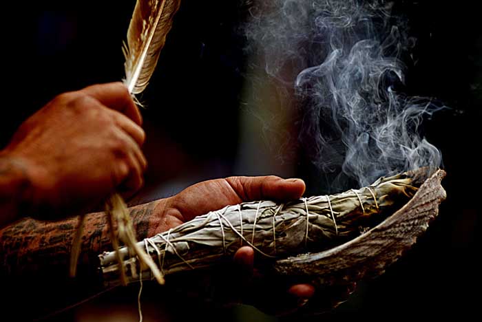 Smudging Feather Burning sage